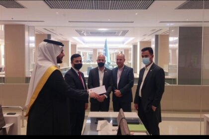 Foreign worker receiving UAE visa sponsorship approval